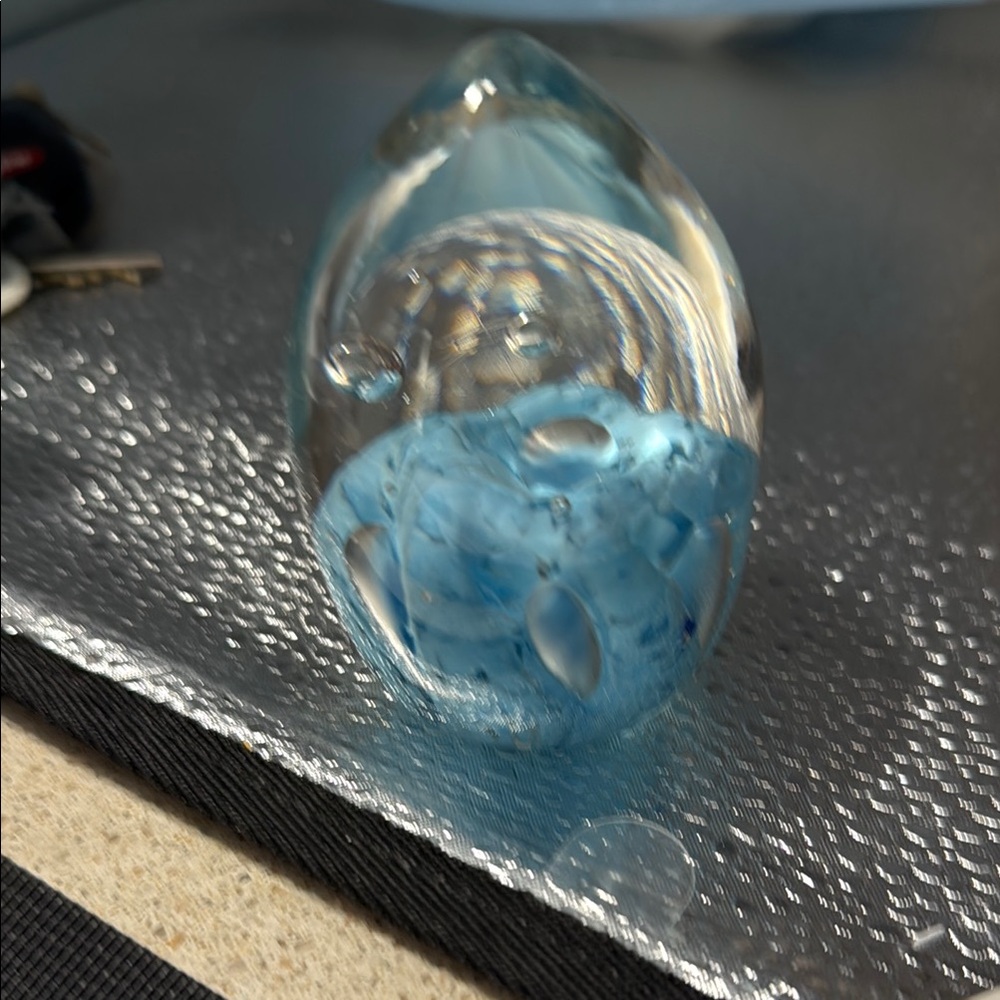 Vintage tear drop shaped stunning art glass paperweight.
